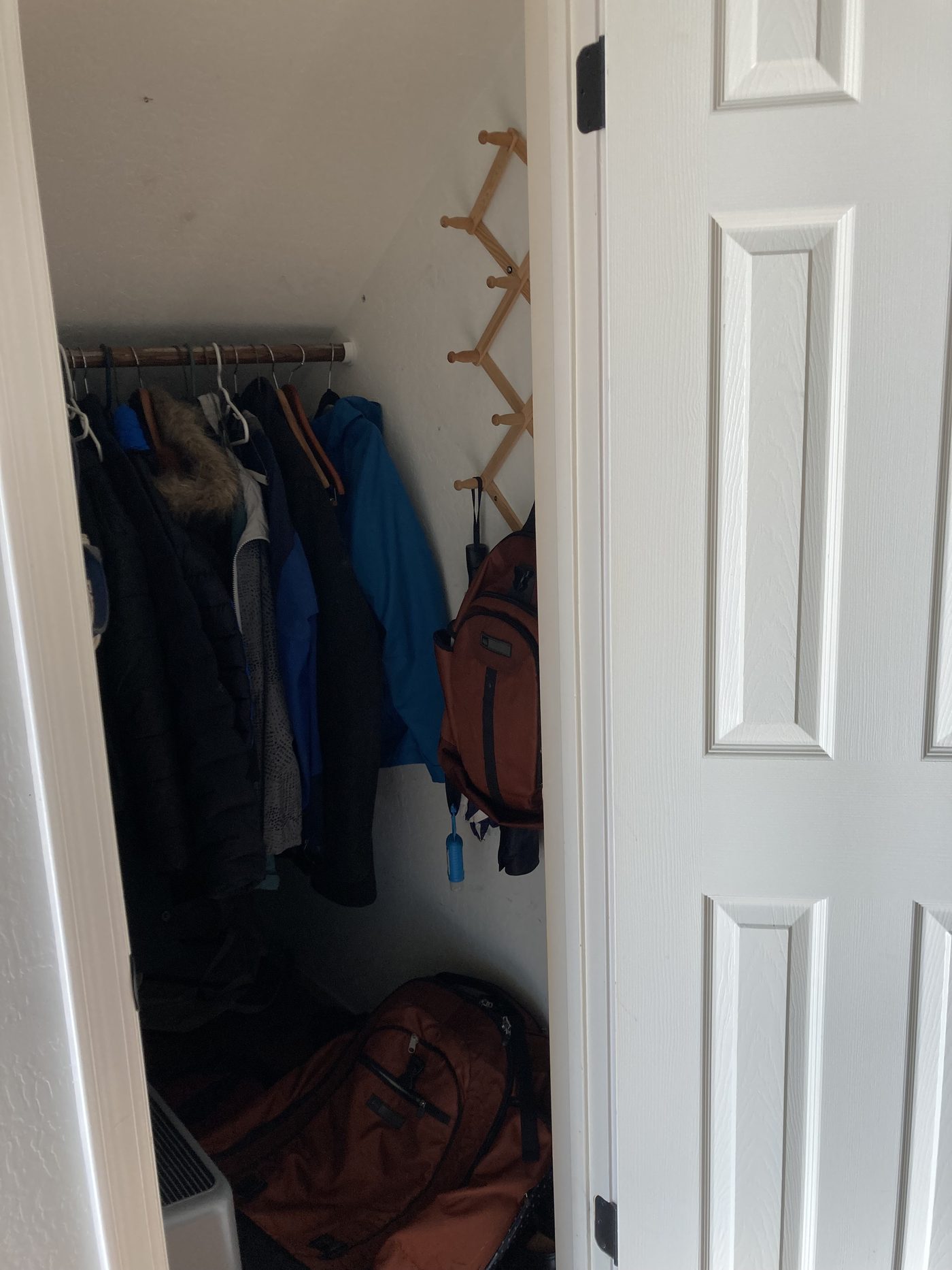 Under-stairs closet, before