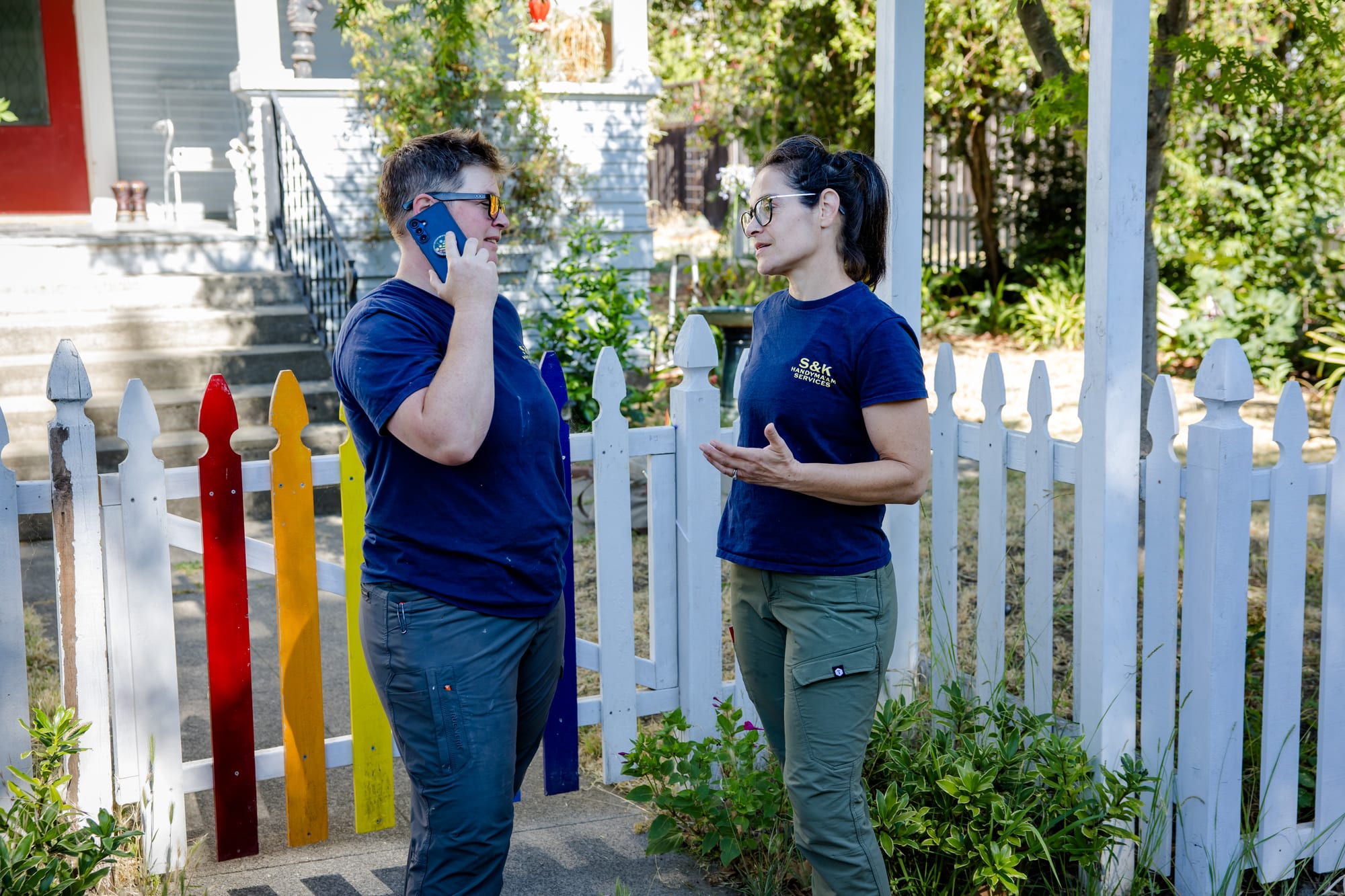 SJ and Lisa of S&K Handyma'am Services coordinating on a residential job site